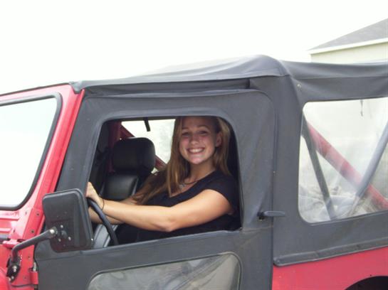 A woman driving a car