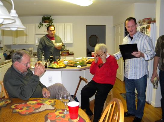 A group of people in a kitchen