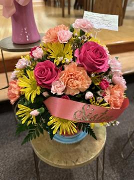 A bouquet of flowers on a table