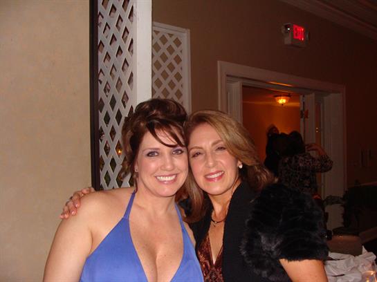 A couple of women posing for a picture
