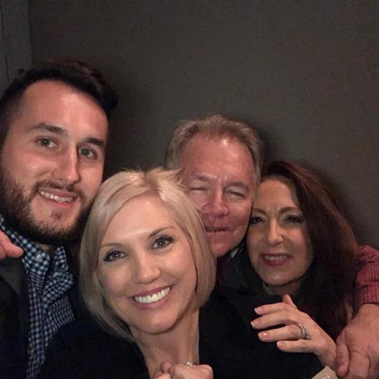 A group of people posing for a photo