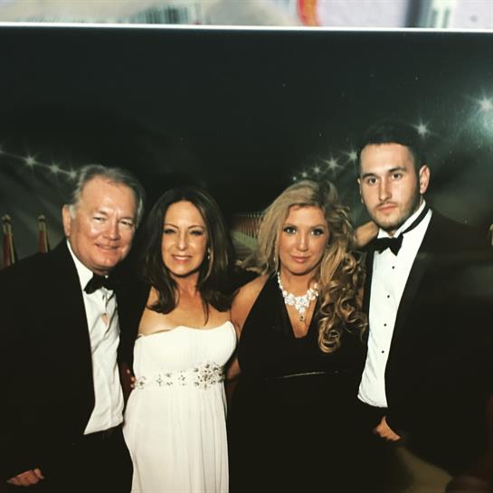 A group of people posing for a photo