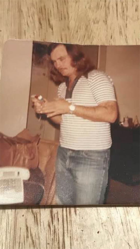 A man holding a game controller