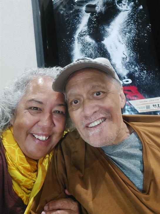 Two happy people share a warm, memorable moment in a cozy place.