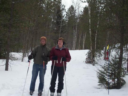 A couple of people on skis