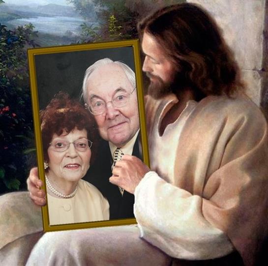 Jesus gently holds a framed portrait of an elderly couple, highlighting their love.