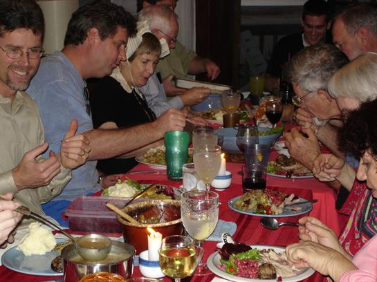 A group of people sitting around a table