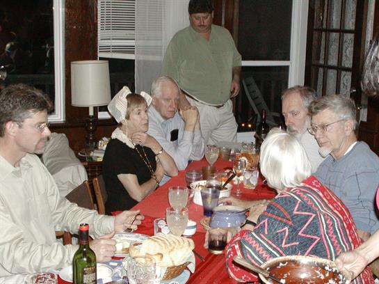 A group of people sitting around a table