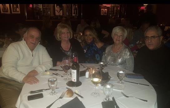 A group of people sitting at a table