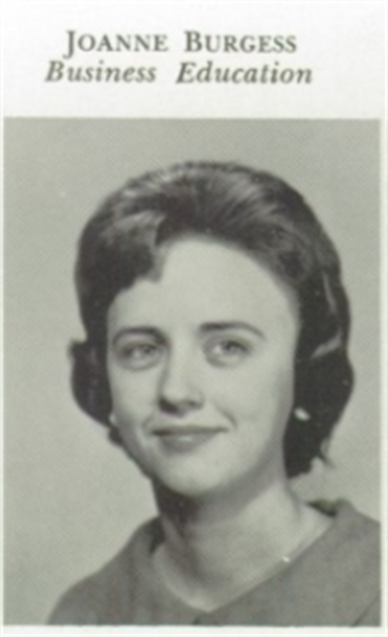 Joanne Burgess presents a professional portrait showcasing her dedication to business education.