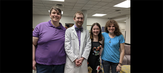 A group of people posing for a photo