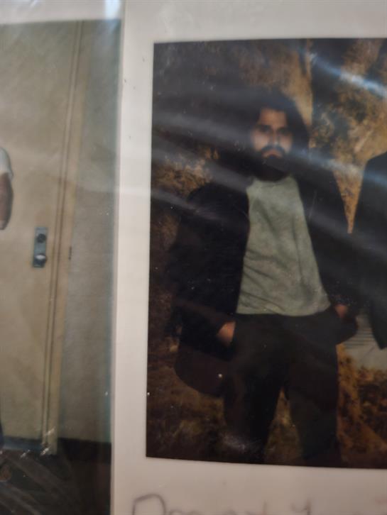 A man standing in front of a door