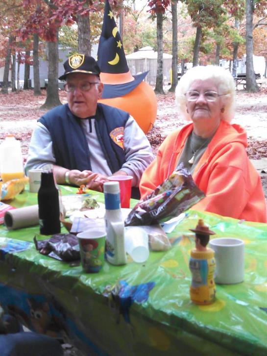 A man and woman sitting at a table