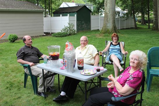 A group of people sitting around a table