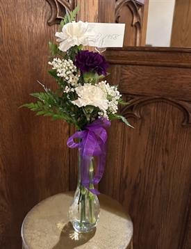 A vase with flowers in it