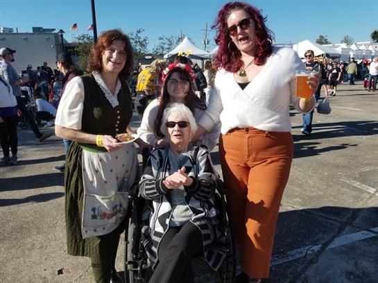 A group of women standing next to each other