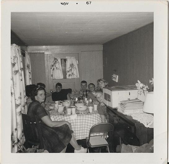 A group of people sitting at a table