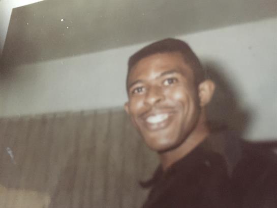 A man smiling at the camera