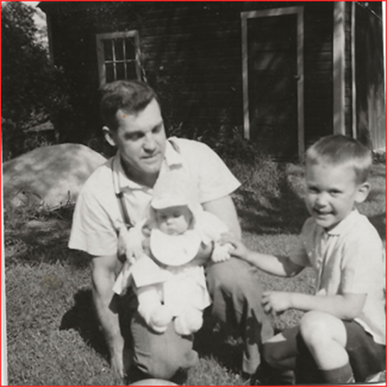 A man and a child sitting on a lap