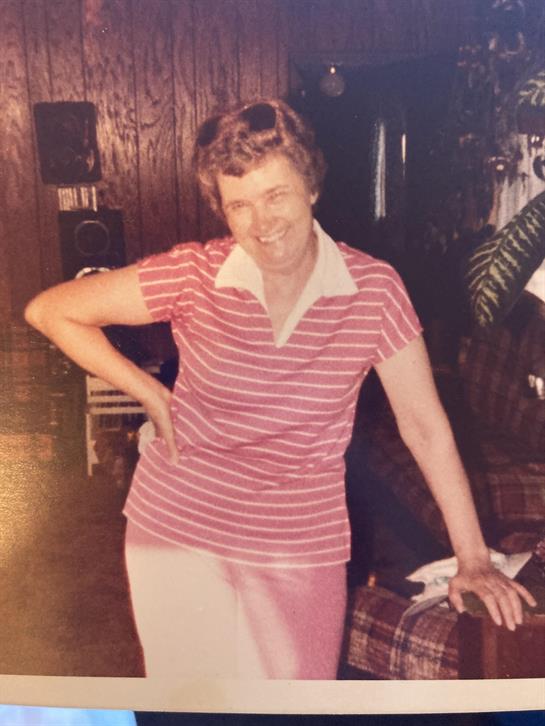 A woman in a striped shirt