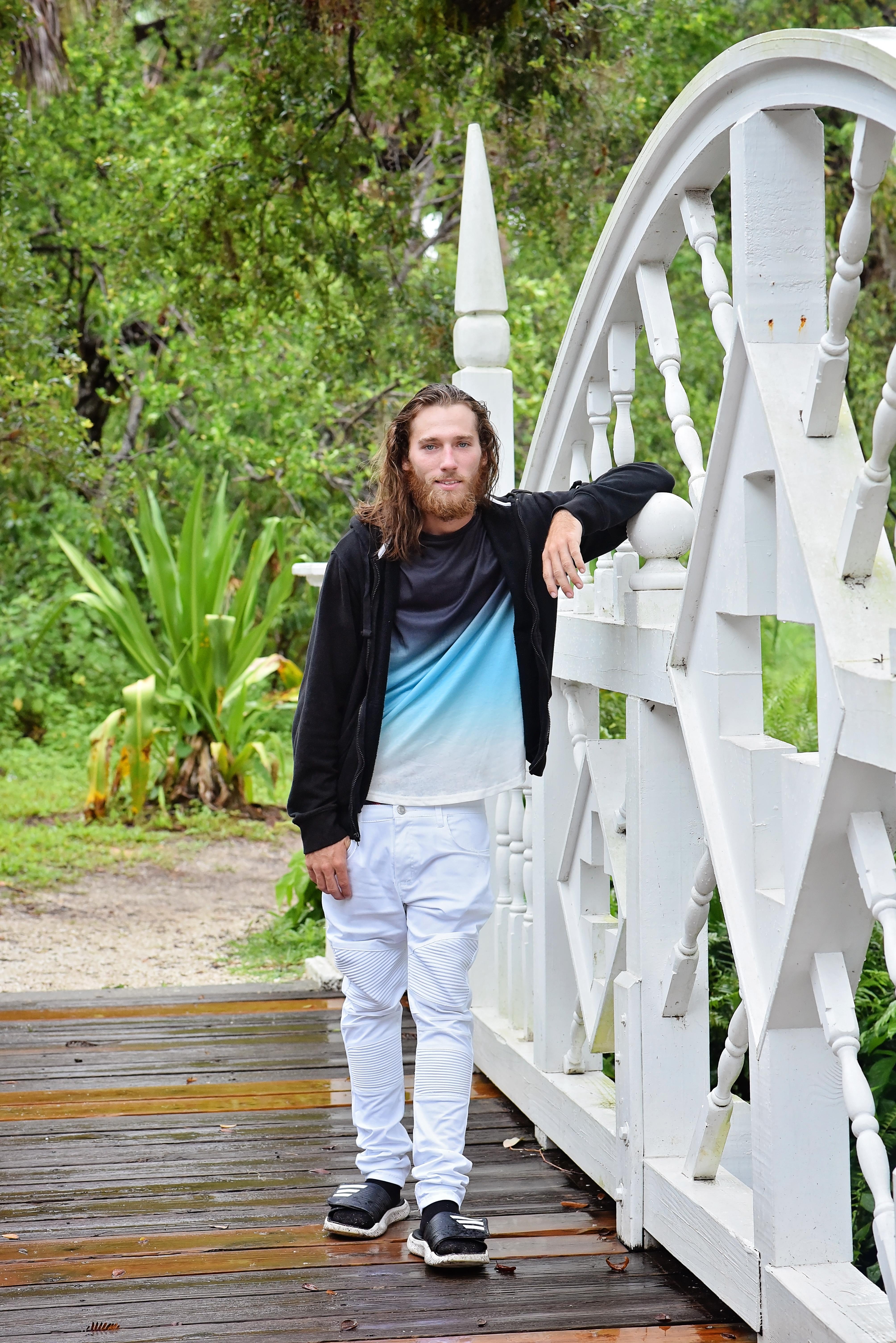 A man standing on a bridge