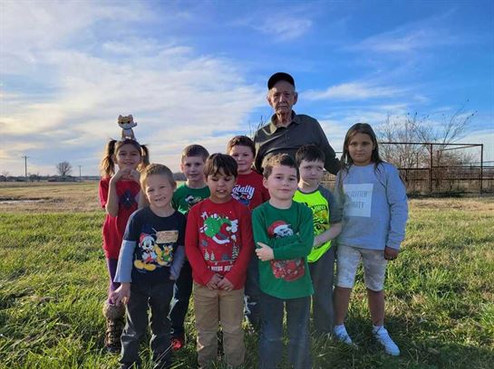 A group of children posing for a photo