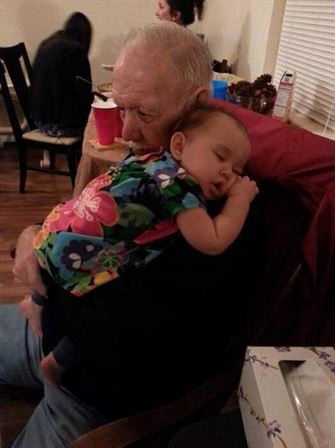 A man holding a baby