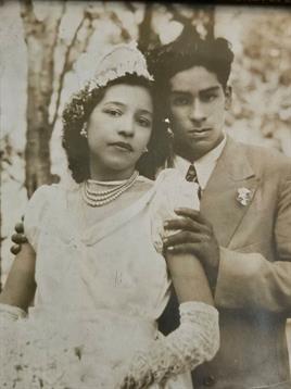 A man and woman posing for a picture