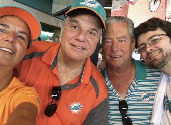 A group of men taking a selfie