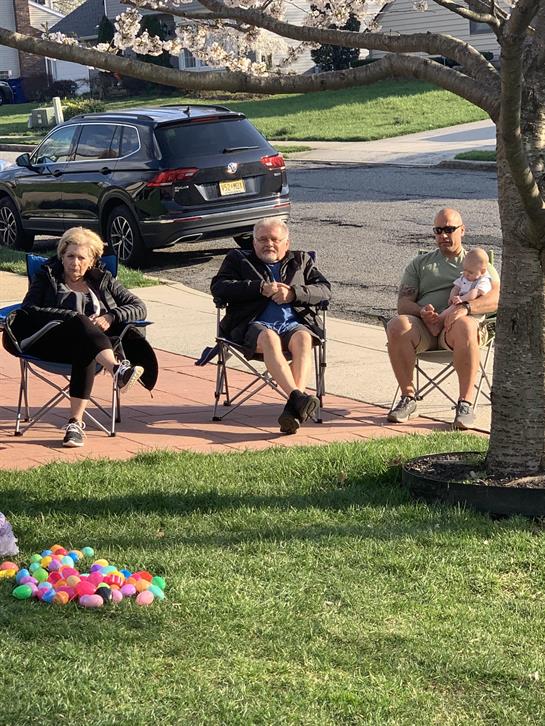 A group of people sitting in chairs
