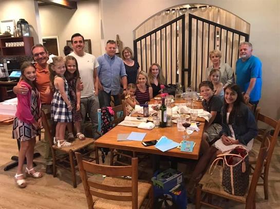 A group of people around a table