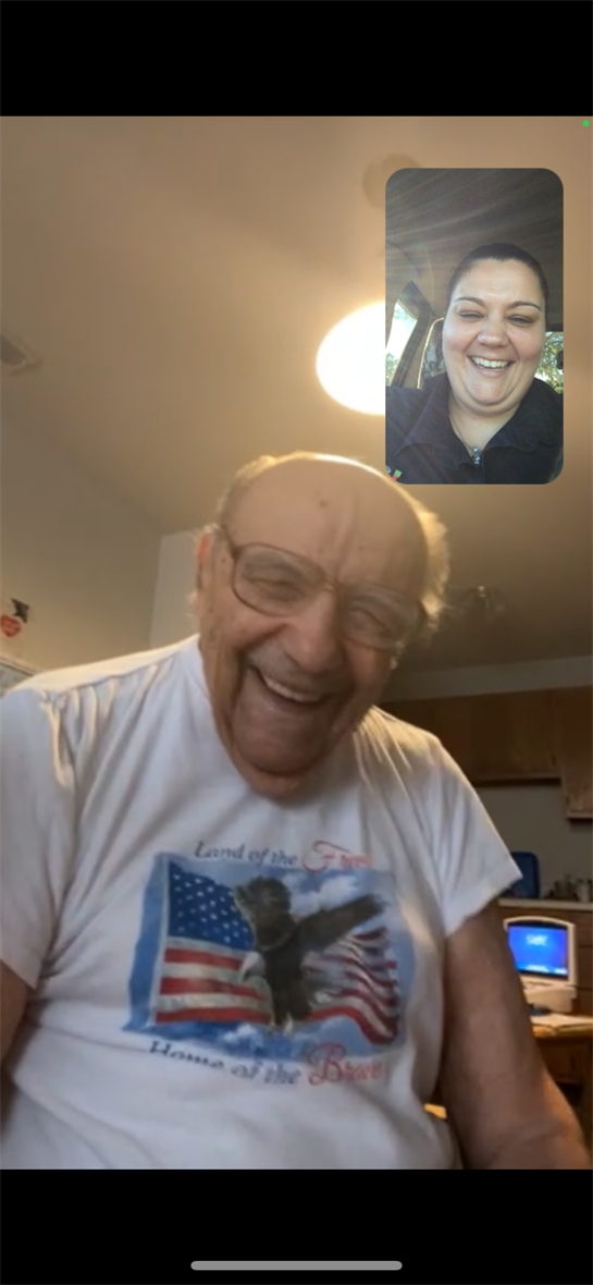 A man smiling and a woman smiling