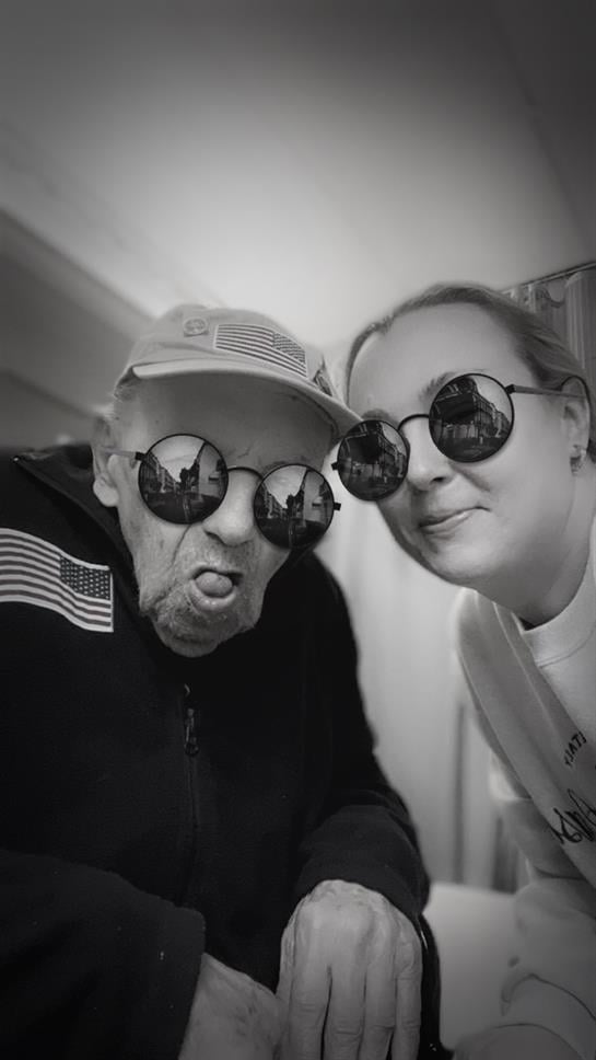 A man and woman taking a selfie
