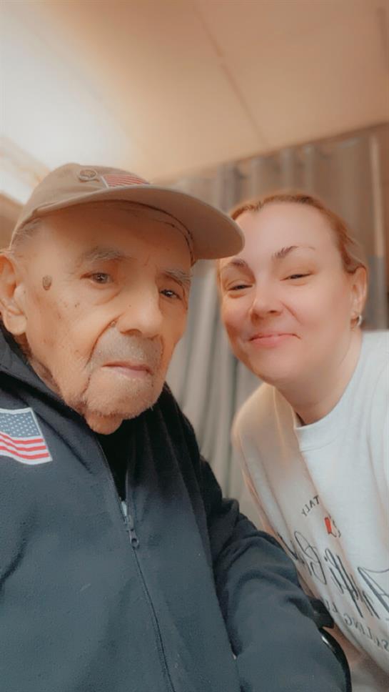 A man and woman taking a selfie
