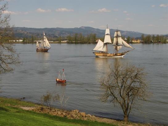 Several sailboats on a lake