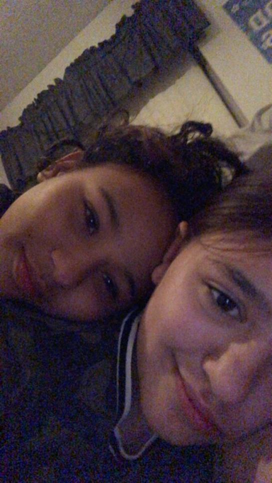 Close friends enjoy a quiet moment together, resting peacefully in a warm and inviting atmosphere.