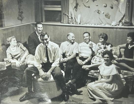 A group of people sitting on a couch