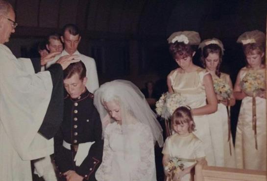 A group of people in wedding attire