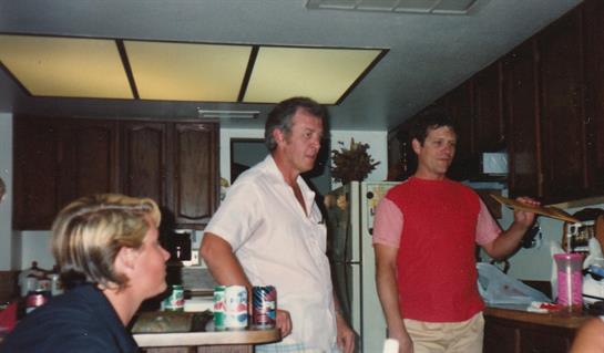 A group of people in a kitchen