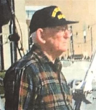 An old man wearing a hat