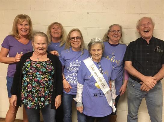 A group of people posing for a photo