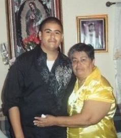 A man and woman posing for a picture