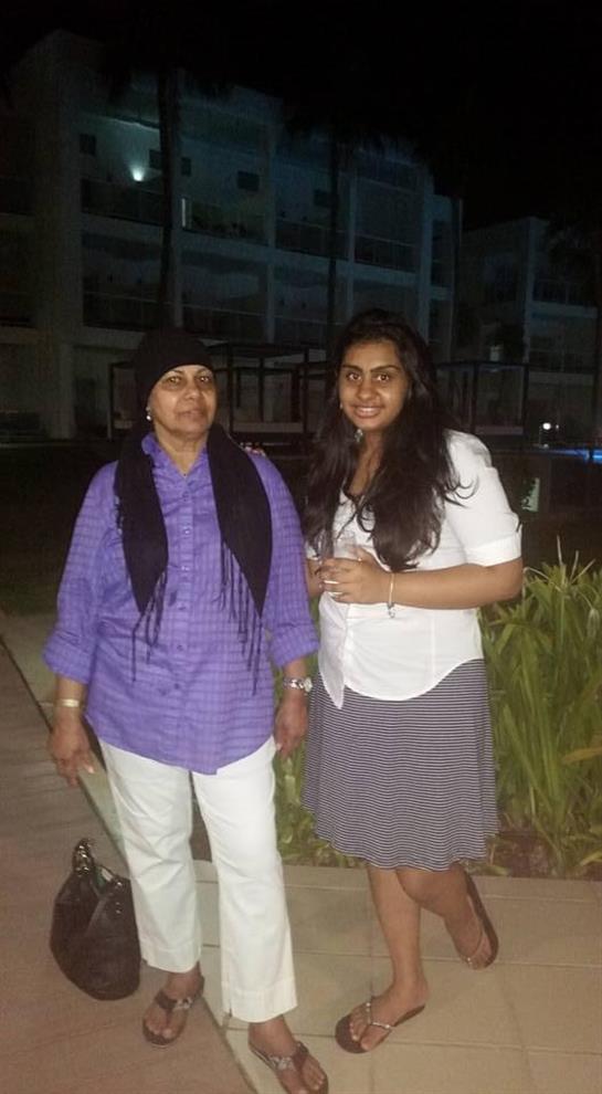 Two women standing next to each other
