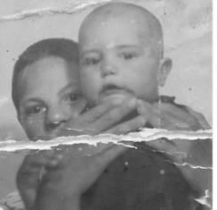 A close-up of a young boy and a young girl