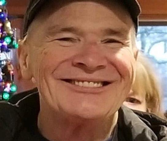 A man smiling at the camera