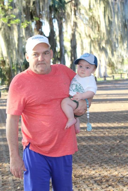 A man holding a baby
