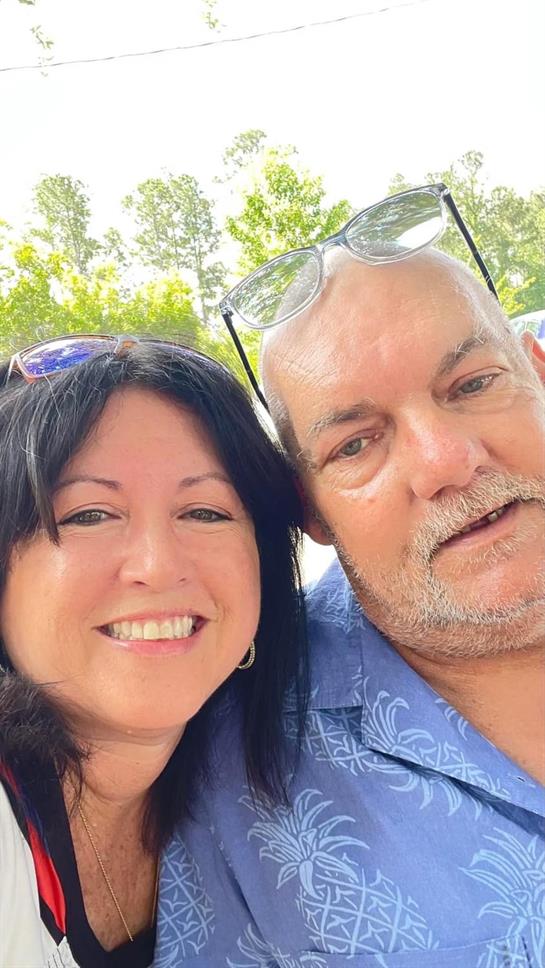 A man and woman taking a selfie