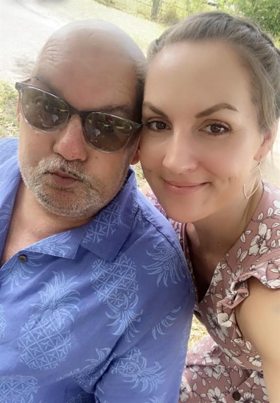 A man and woman taking a selfie