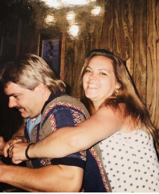 A man and woman hugging