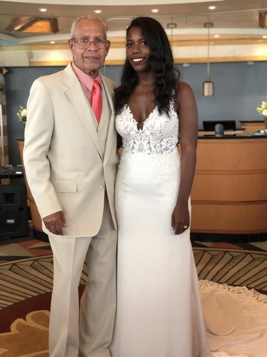 A man and woman in a wedding dress